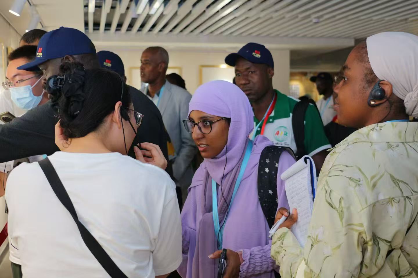 International visitors at a museum reception