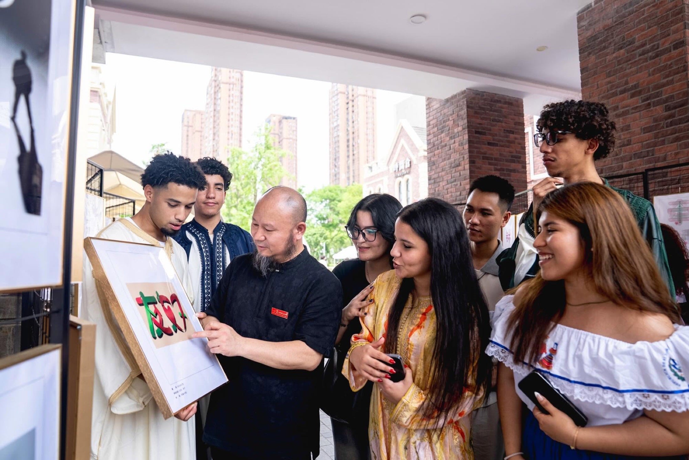 International visitors learning about Chinese character art